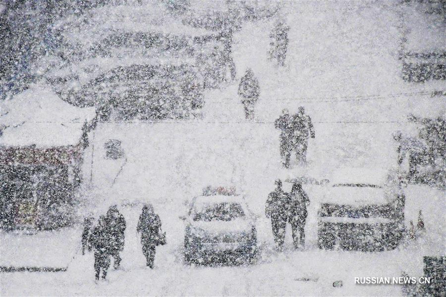 В городе Яньтай выпал снег 