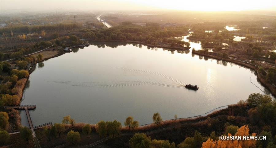 Водно-болотные угодья в г. Цзинань во время вечерней зари