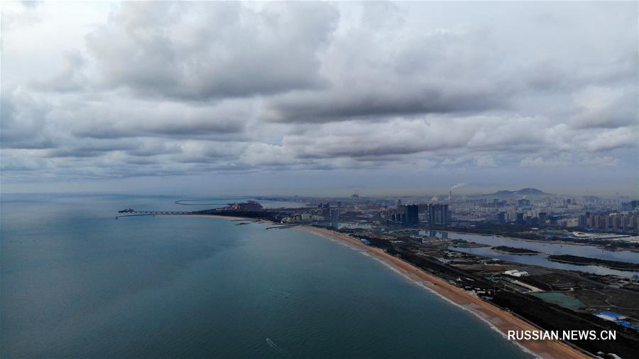 Восход солнца над морем в Жичжао