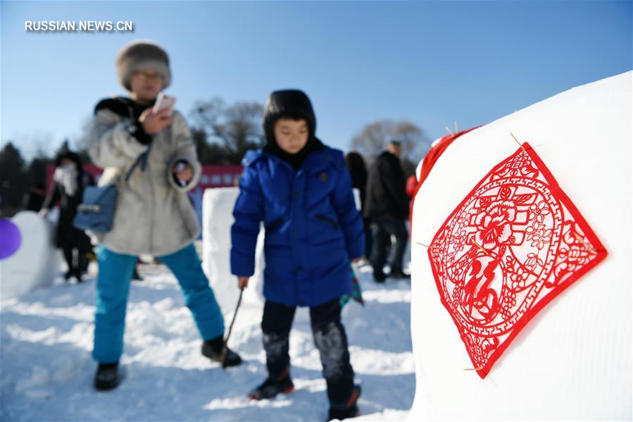 Семейный конкурс на лучшие скульптуры из снега в Харбине