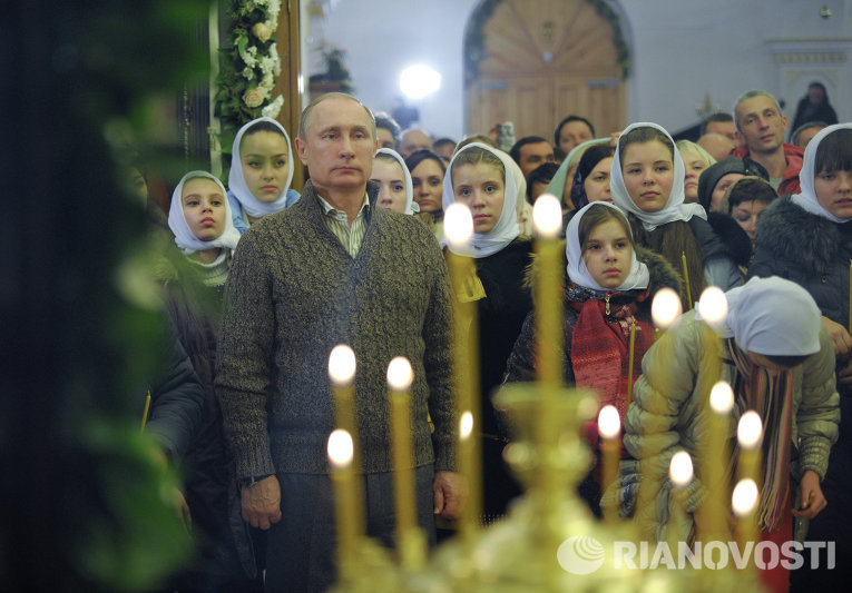 Президент России Владимир Путин во время Рождественского богослужения