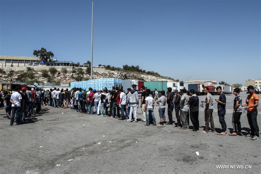 GREECE-PIRAEUS-REFUGEES-TOURISM