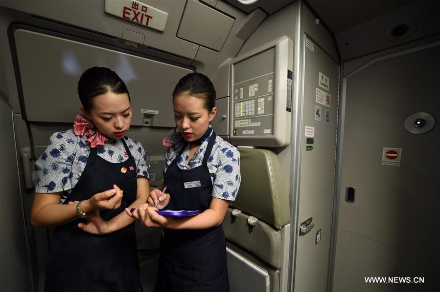 CHINA-GANSU-TWIN SISTERS-FLIGHT STEWARDESS (CN)